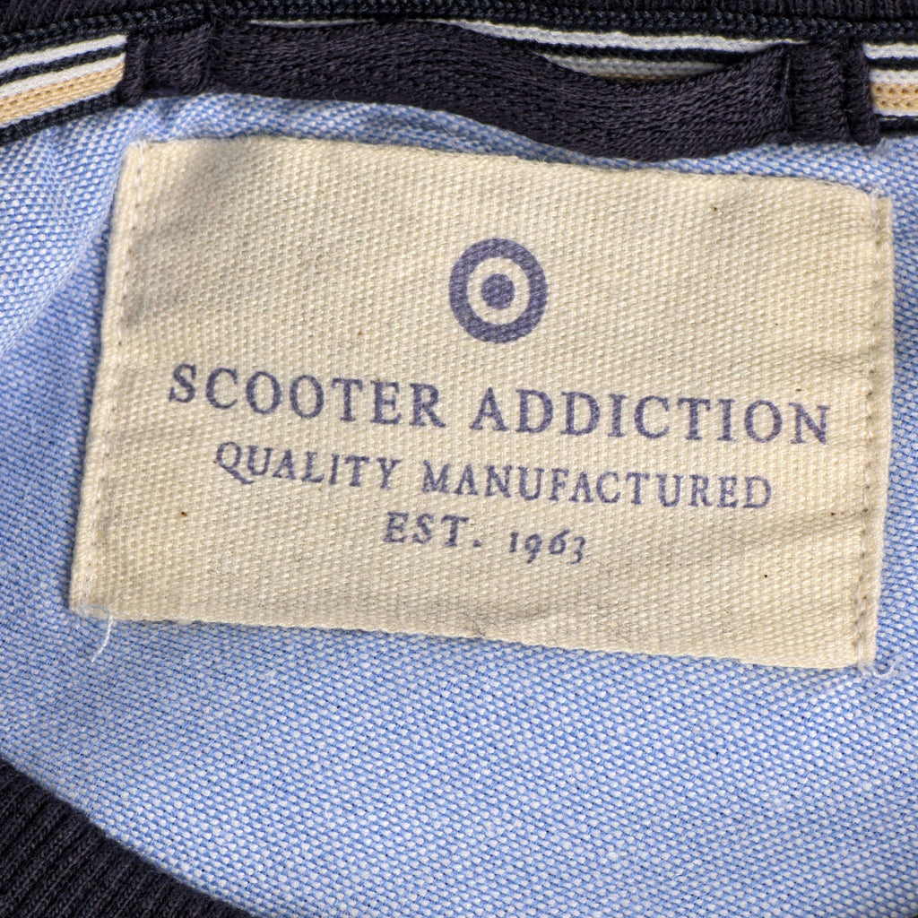 Detalle etiqueta interior Scooter Addiction Quality Manufactured desde 1963