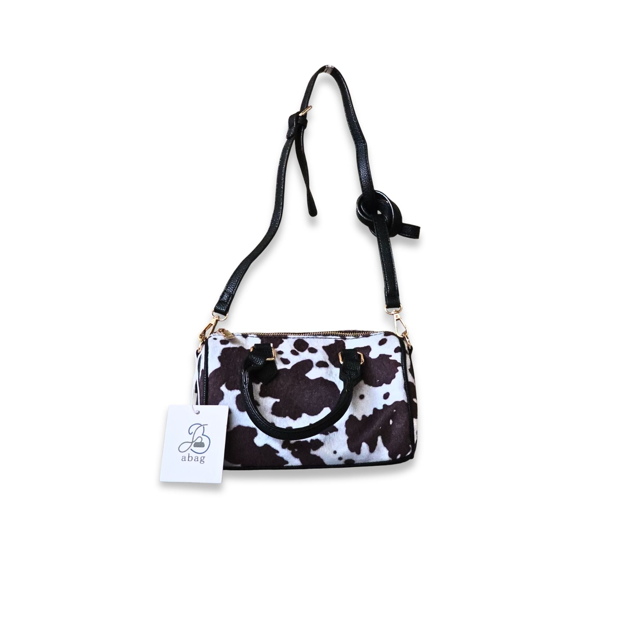 Bolso Boston Bowling Abag Cow Print con correa ajustable - Vista con bandolera y etiqueta